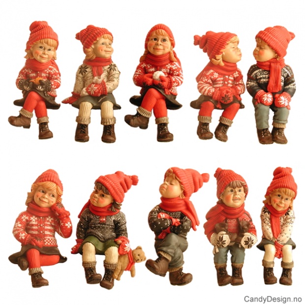 Medium Vinterbarn sittende på kant assortert