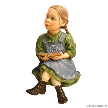 Sittende Carl Larsson Pike med  bok i hånden